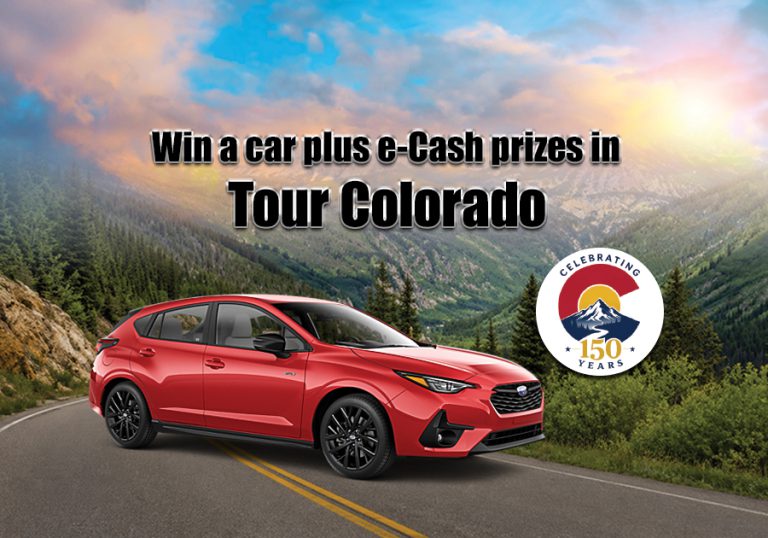 A red Subaru Crosstrek next to the 150 Years of Colorado logo.